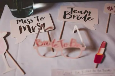 Bridal shower props reading Miss to Mrs, Team Bride and Bride to Be glasses