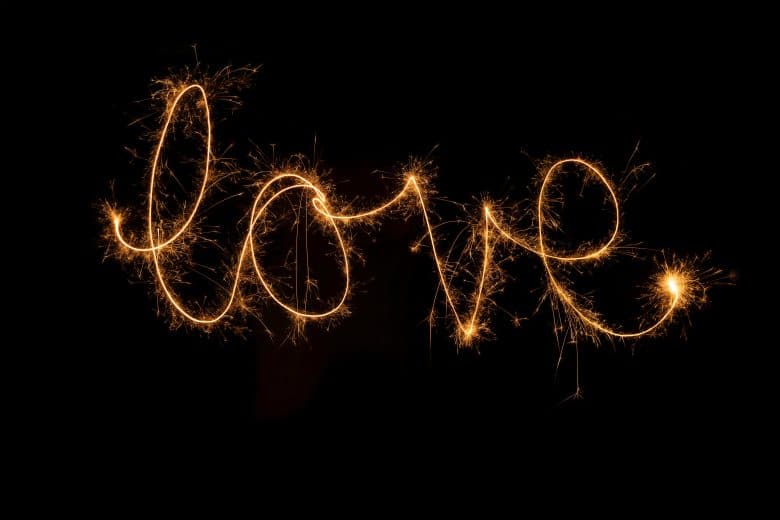 Love spelled out with wedding sparklers
