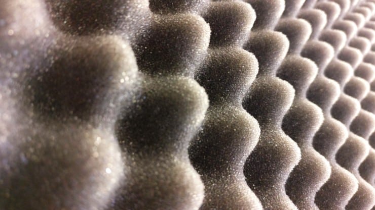 Reducing echo in a room using acoustic panels
